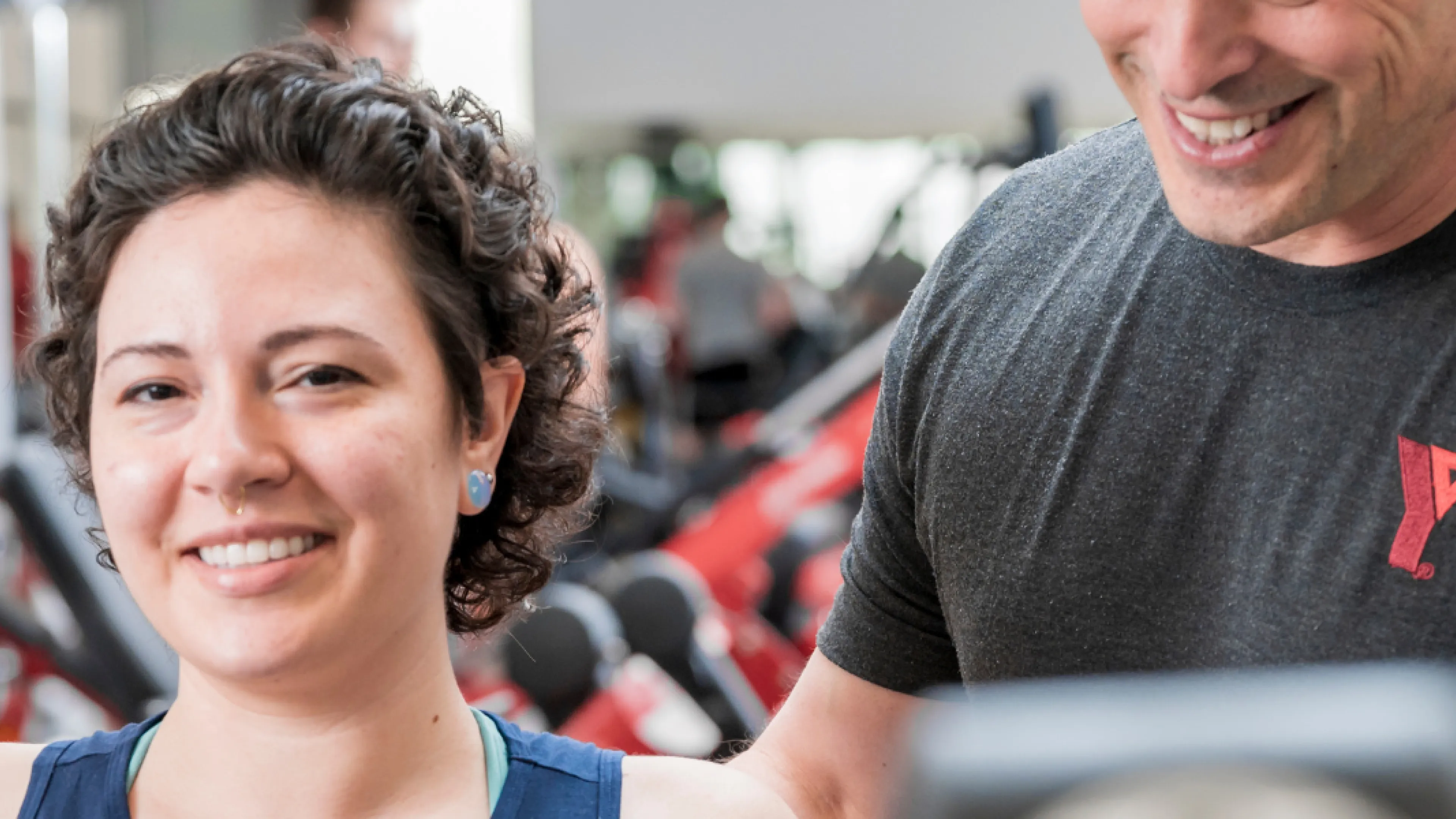 Lady being trained by a Y team member