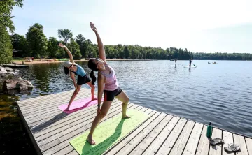 People Stretching on Dock at YMCA Wanakita
